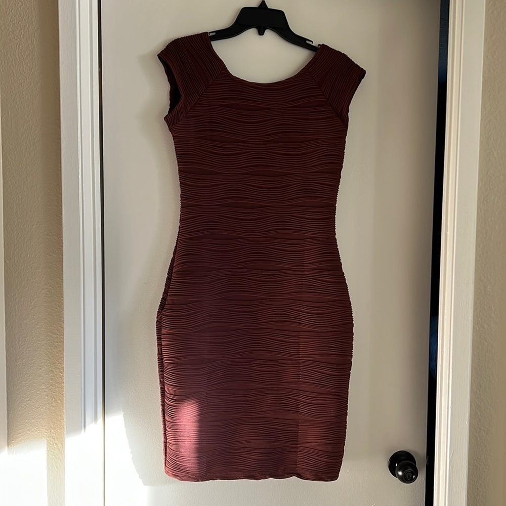 Beautiful cocktail dress never been worn.
